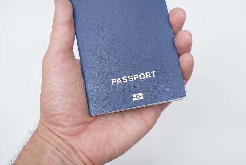 Blauer Pass Mit Biometrie In Einer Mann S Hand Weisser Hintergrund Stockfoto Bild Von Weisser Hintergrund