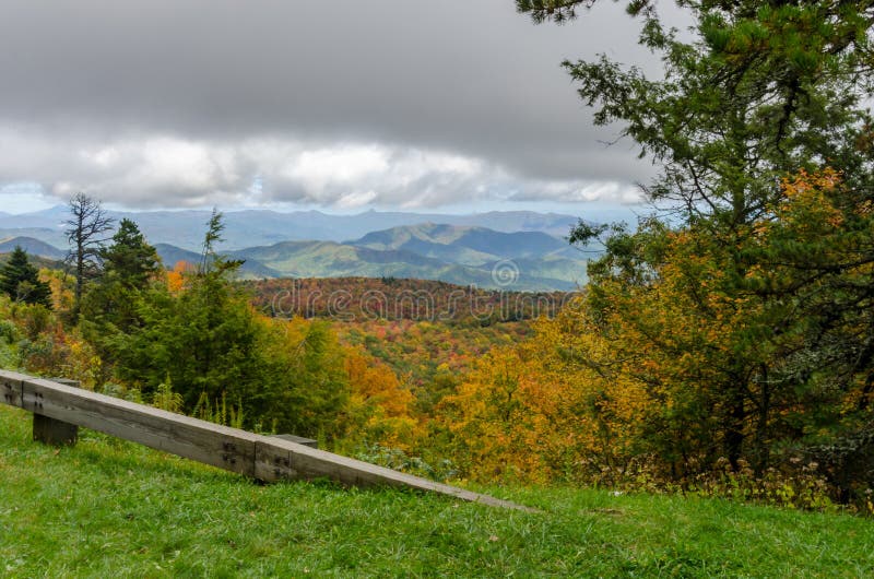 Blue Ridge Parkway guard rail in Fall near the rough ridge tunnel overlook. Blue Ridge Parkway guard rail in Fall near the rough ridge tunnel overlook