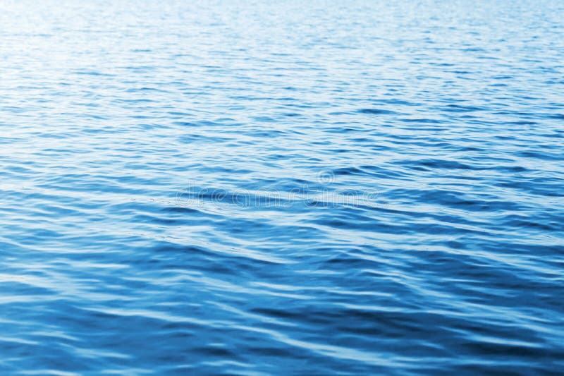 Blue water photo background with soft waves. Blue water photo background with soft waves