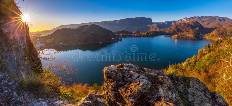 Bled, Slovenia - Beautiful autumn sunrise at Lake Bled on a panoramic shot with Pilgrimage Church of the Assumption of Maria royalty free stock images Bled, Slovenia - Beautiful autumn sunrise at Lake Bled on a panoramic shot with Pilgrimage Church of the Assumption of Maria royalty free stock images