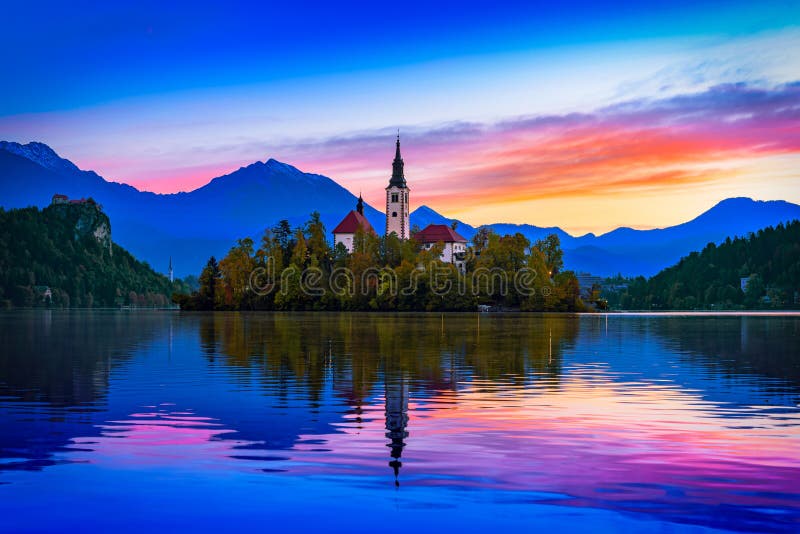 Bled, Slovenia. Morning view of Bled Lake, island and church with Julian Alps in background