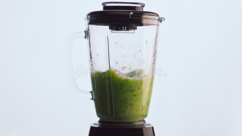 Blending Green Vegetable Smoothie in Mixer Close Up. Preparing Vitamin ...