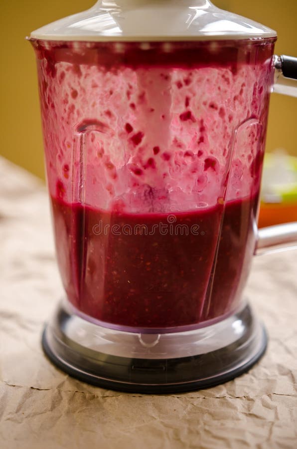 Blending raspberry puree