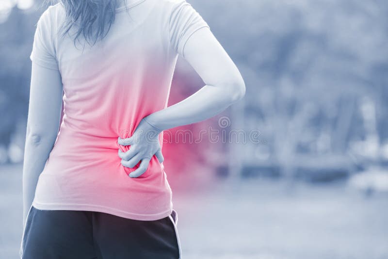 Blessure de taille de femme en parc photographie stock Blessure de taille de femme en parc photographie stock