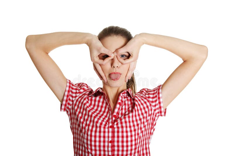 Blije vrouwelijke tiener die een gezicht maakt. stock afbeelding Blije vrouwelijke tiener die een gezicht maakt. stock afbeelding