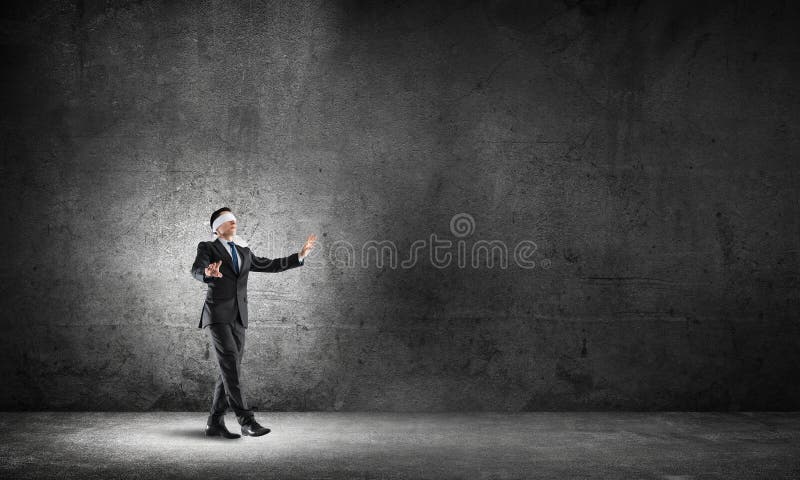 Business Concept of Risk with Businessman Wearing Blindfold in Empty ...