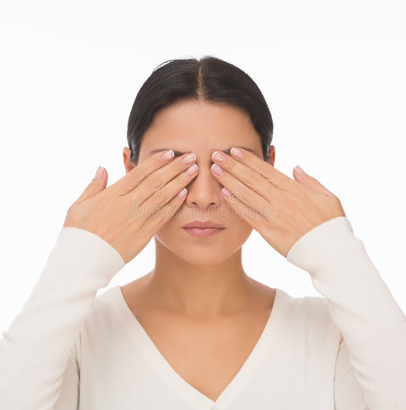 Blind woman closed face with hands