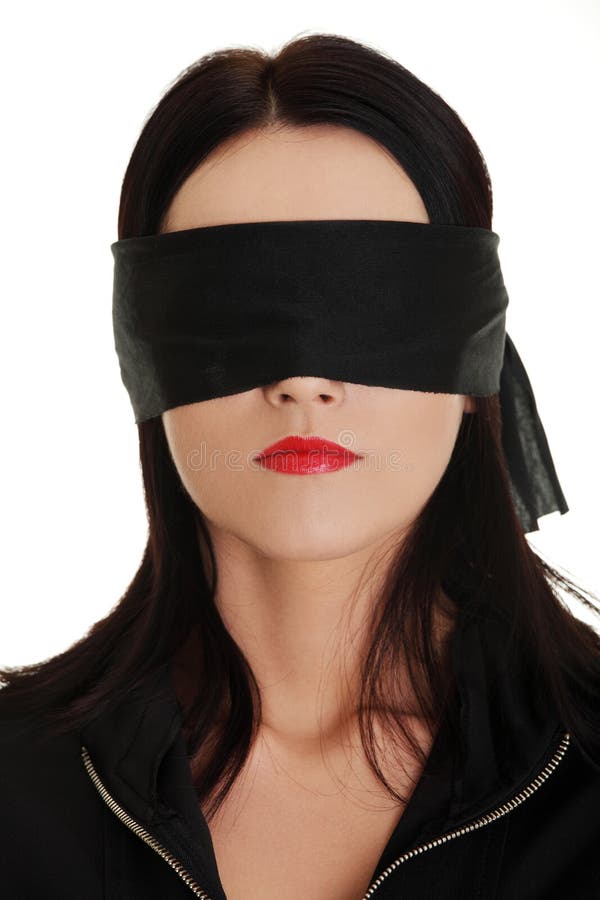 confused blindfolded woman on a white background Stock Photo