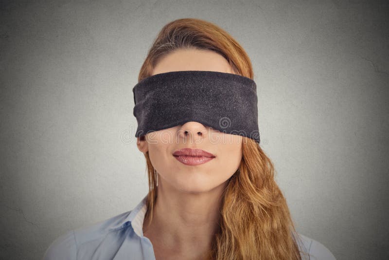 Young Woman Wearing Black Blindfold Isolated On Grey Stock Photo