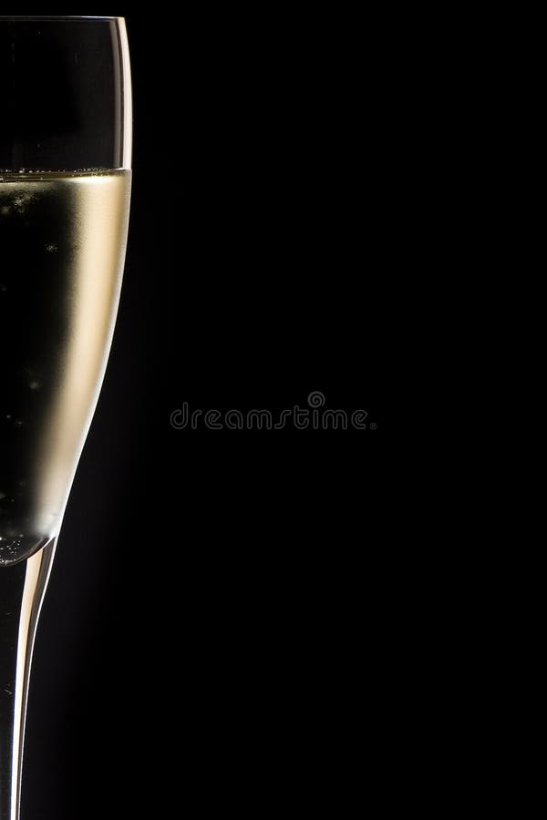 Champagne glass close up with black background. Champagne glass close up with black background