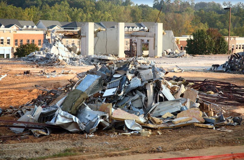 Piles of rubble at a building demolition site. Piles of rubble at a building demolition site.