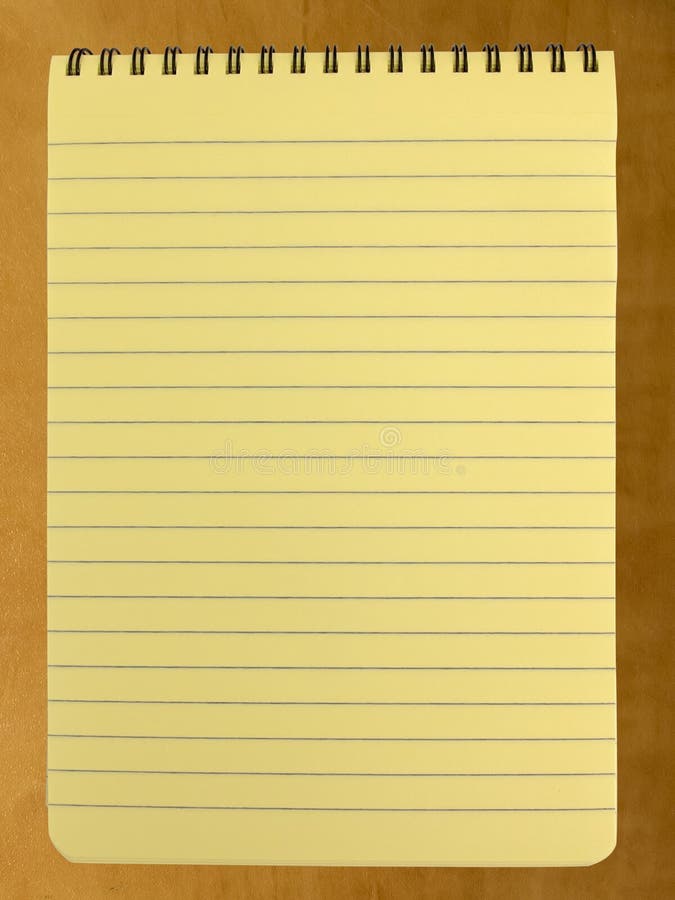 Blocco note giallo diretto a spirale immagini stock libere da diritti Blocco note giallo diretto a spirale immagini stock libere da diritti