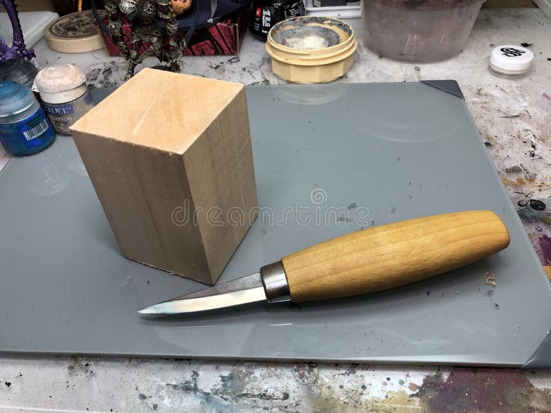 Block of wood and knife