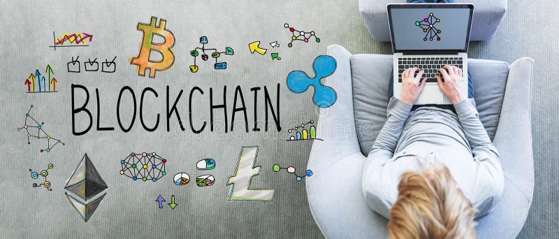 Blockchain with man using a laptop stock photography