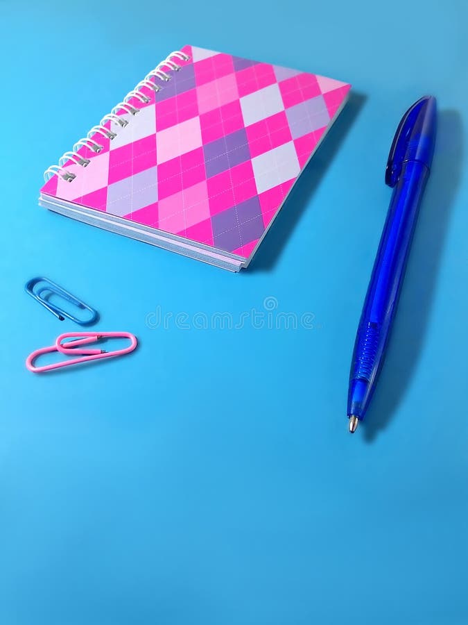 Diary and accessories on blue background. Diary and accessories on blue background