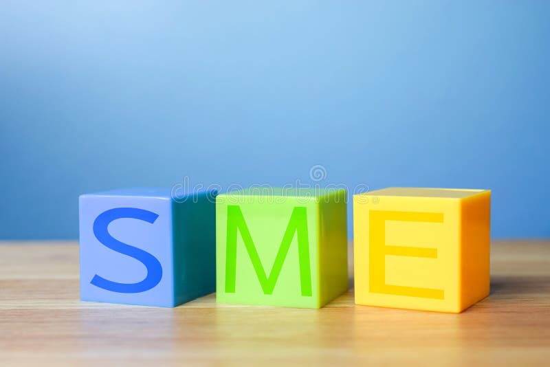 Blocs de couleur avec la PME sur la petite et moyenne entreprise Co de table - images libres de droits Blocs de couleur avec la PME sur la petite et moyenne entreprise Co de table - images libres de droits