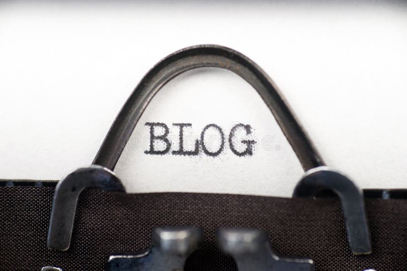 Blog text on retro typewriter stock photos