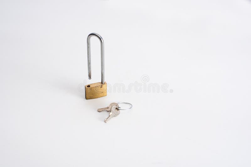 Skinny padlock and set of two keys on white background. Access, business, close, concept, dkeys, element, entrance, keyhole, metal, object, open, privacy, property, protection, safe, safety, secret, security, sign, steel, symbol, unlock, unlocking, secure, private, metaphor, long. Skinny padlock and set of two keys on white background. Access, business, close, concept, dkeys, element, entrance, keyhole, metal, object, open, privacy, property, protection, safe, safety, secret, security, sign, steel, symbol, unlock, unlocking, secure, private, metaphor, long