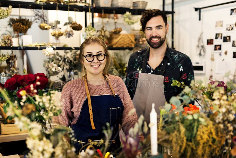 Blomsterhandelsmå och medelstora företagägare royaltyfria foton