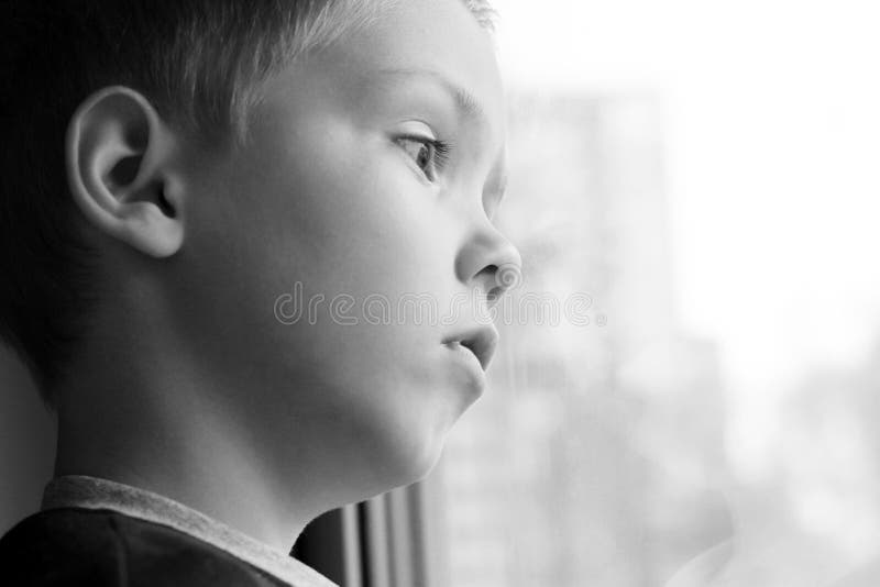 193 Sad Little Boy Looks Out Window Stock Photos - Free & Royalty-Free  Stock Photos from Dreamstime