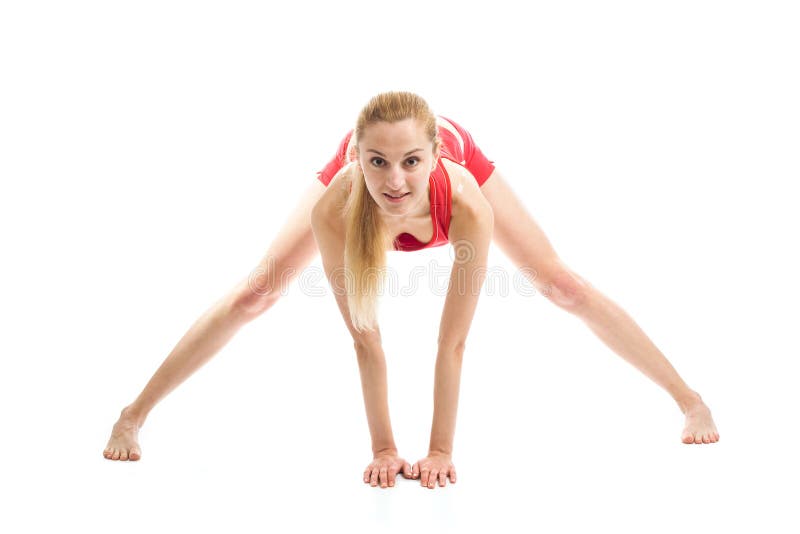 Blond girl doing gymnastic exercises