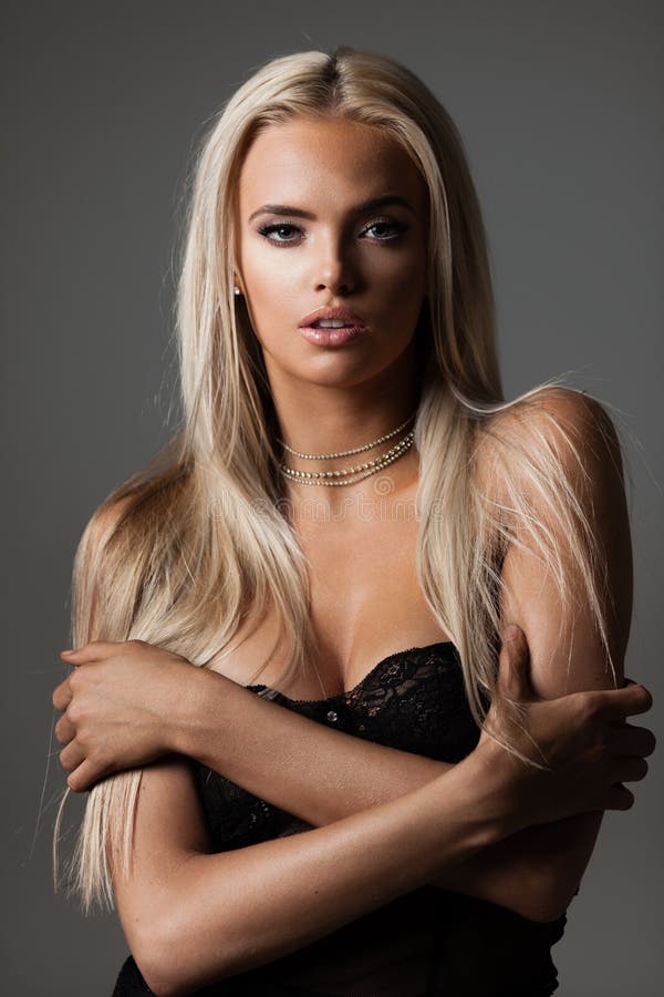 Blond hair on grey royalty free stock images Blond hair on grey royalty free stock images