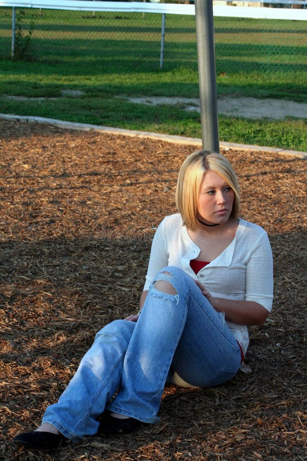 Young Girl Sits on Porch stock image. Image of brick, cute - 7473943