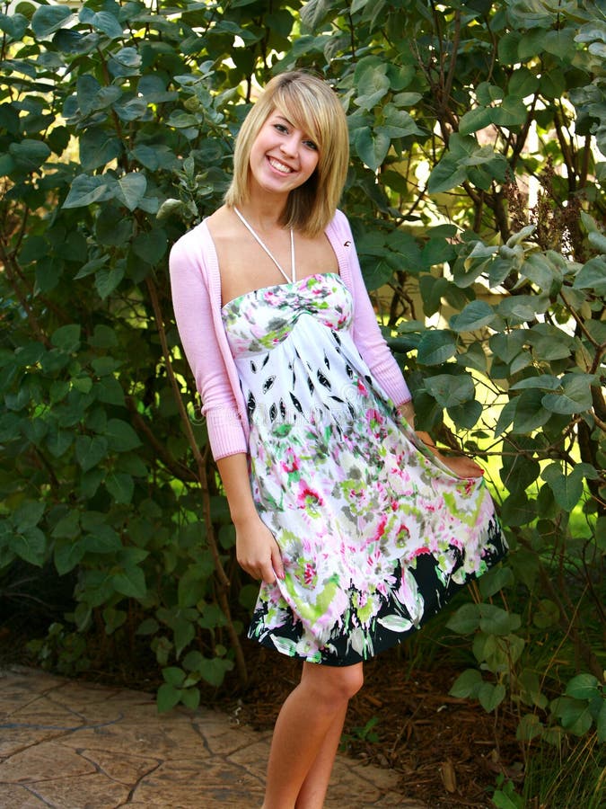 Blond Teen In Floral Dress Royalty Free Stock Image