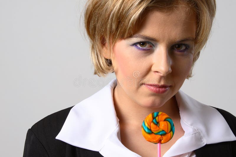 Blond woman with lollipop