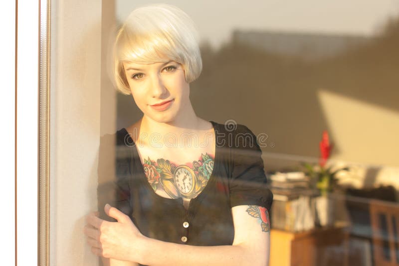 Blond woman with tattoo