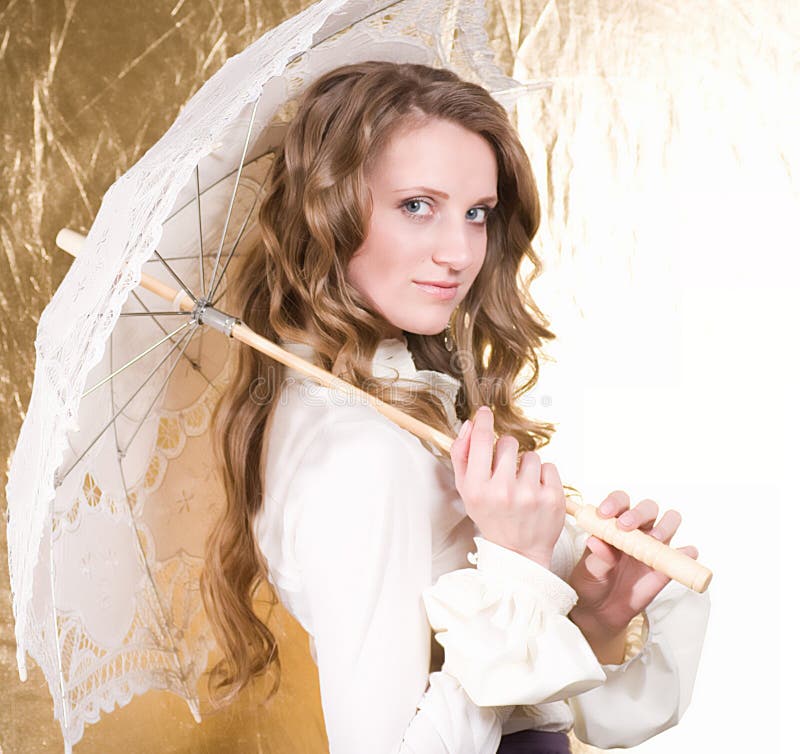 Blond woman with vintage umbrella