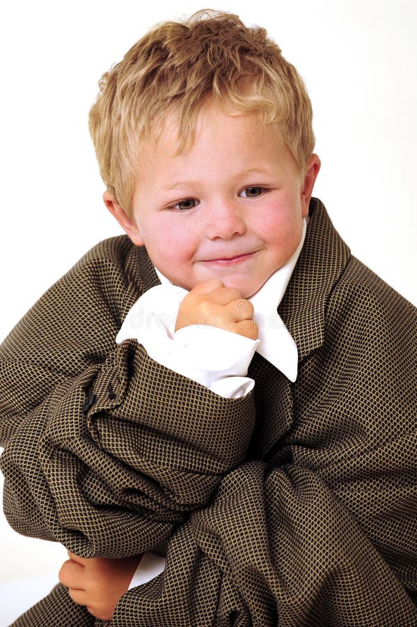 Blond young Boy in oversize business clothes