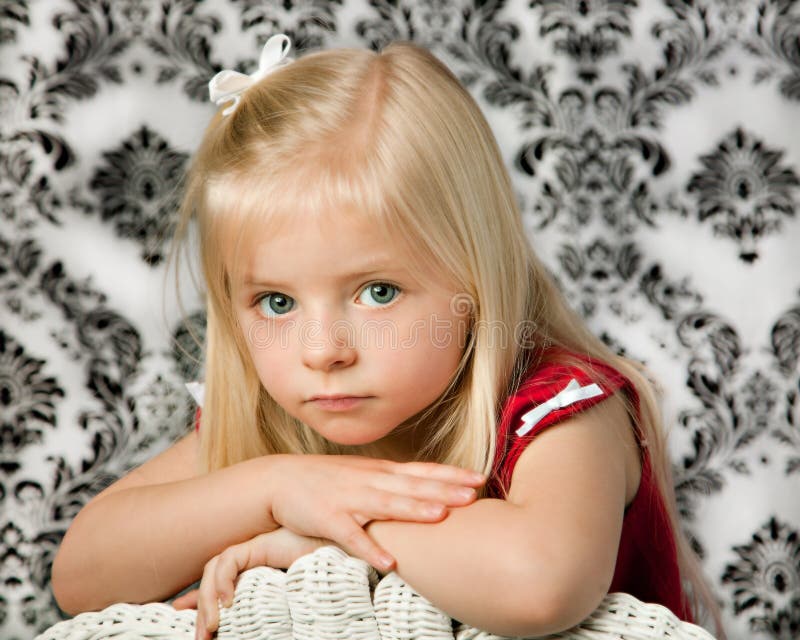 Blond Young Girl with Blue Eyes