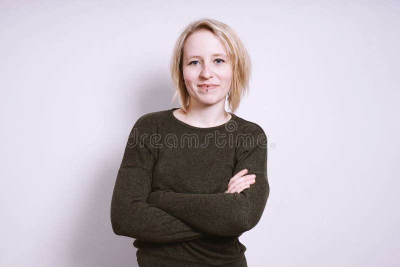 Blond Young Woman with Arms Folded Stock Photo - Image of folded ...