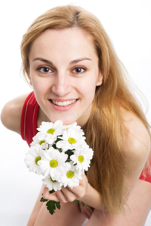 Blonde with a bouquet of chrysanthemums