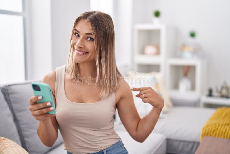 Blonde Caucasian Woman Using Smartphone Typing Message Sitting on the ...