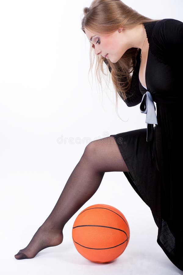 Blonde cute caucasian blonde playing with ball