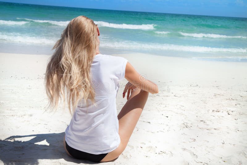 Blonde girl in bikini on the beach - wide 7