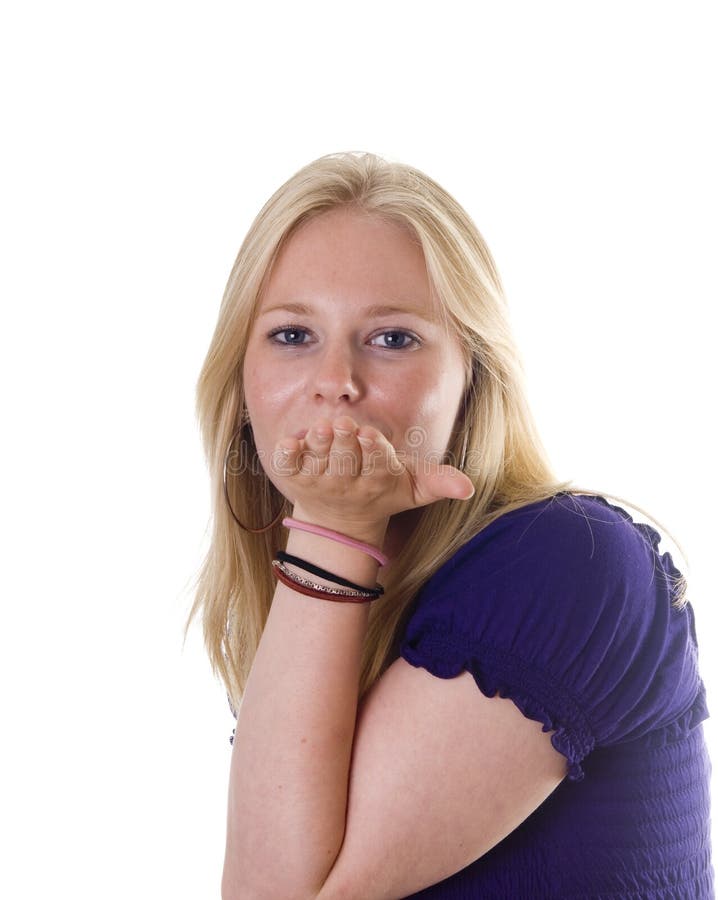 Blonde Girl Blowing A Kiss Towards Camera Royalty Free Stock