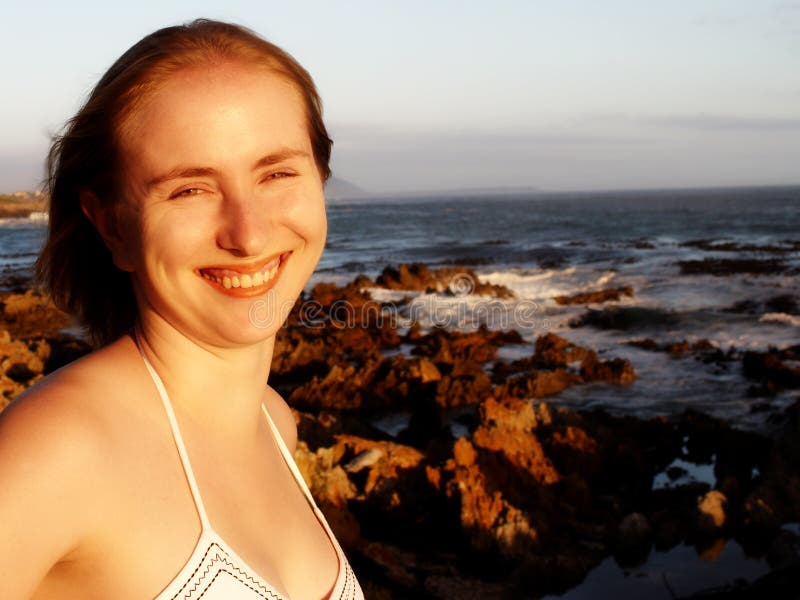 Blonde green-eyed woman smiling