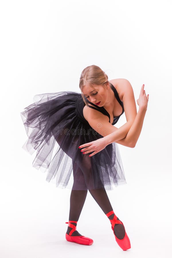 Blonde jonge mooie die balletdanser over witte achtergrond wordt geïsoleerd stock afbeeldingen Blonde jonge mooie die balletdanser over witte achtergrond wordt geïsoleerd stock afbeeldingen