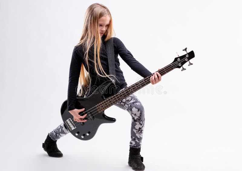 Blonde long haired girl is a bass guitar player royalty free stock photos Blonde long haired girl is a bass guitar player royalty free stock photos