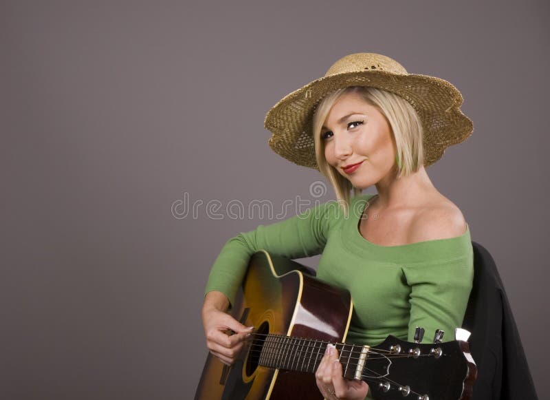 Blonde Playing Guitar