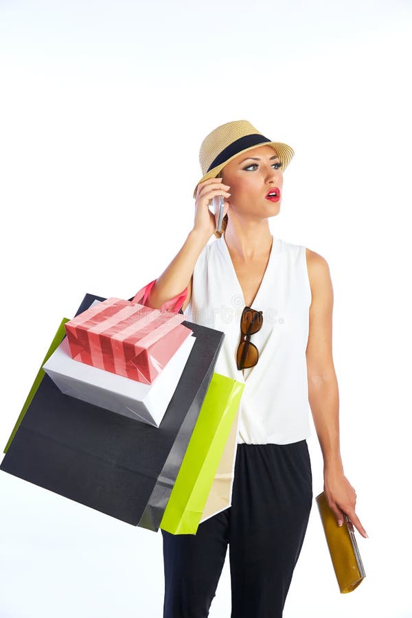 Blonde shopaholic Frau Taschen und Smartphone lizenzfreies stockfoto Blonde shopaholic Frau Taschen und Smartphone lizenzfreies stockfoto