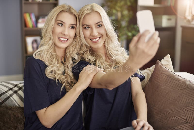 Blonde twins at home stock photo. Image of enjoyment - 67692686