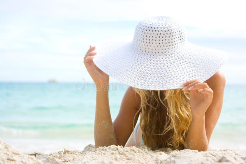 Blonde with white hat