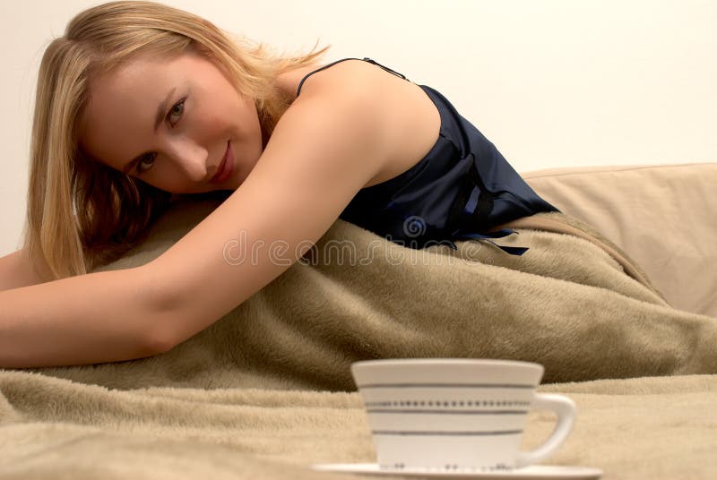 Blonde woman in bed