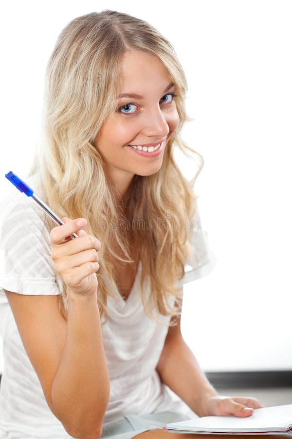 Blonde woman holding pen and notepad