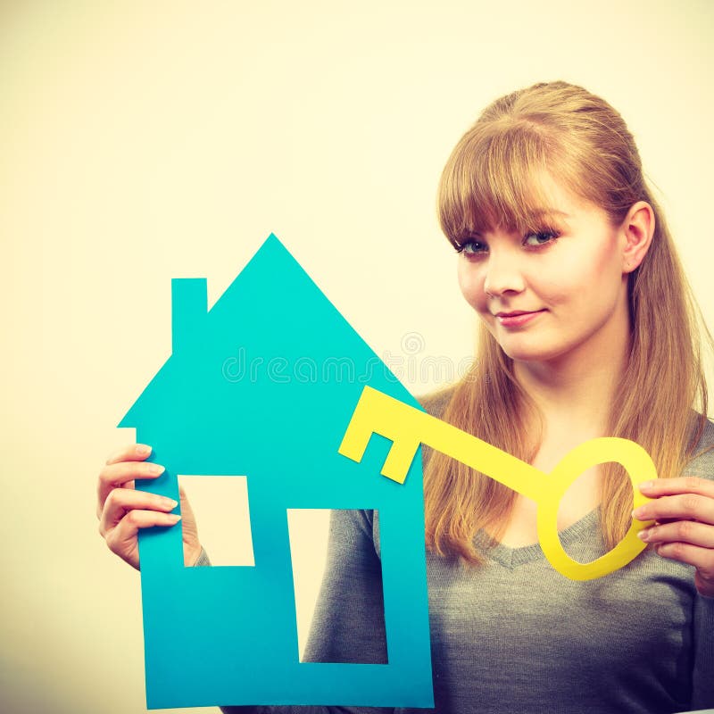 Blonde Woman With House And Key image