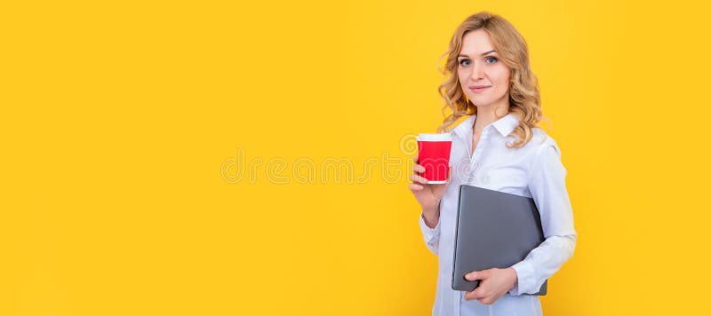 blonde woman smile with coffee cup and laptop on yellow background. Woman isolated face portrait, banner with mock up royalty free stock photography